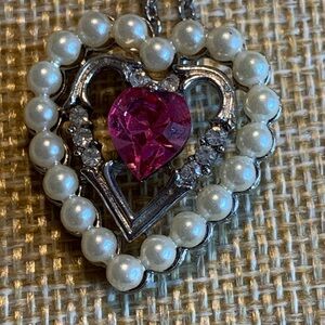 Very vintage 1974 Avon sweetheart pendant.